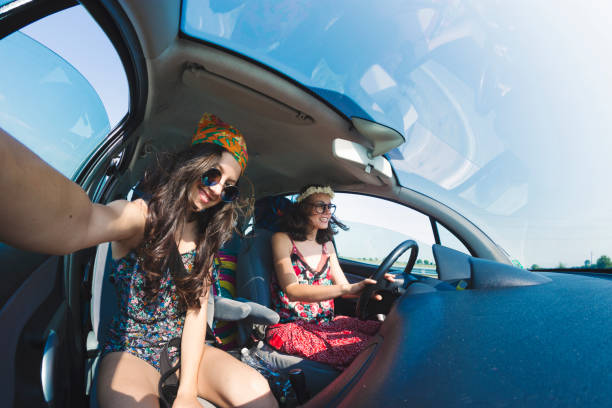 istock Women having fun in a road trip 945139386