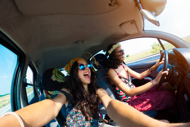 istock Women having fun in a road trip 945139392