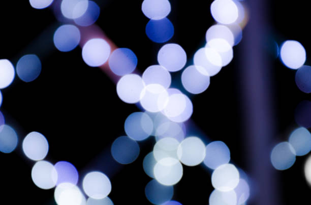 istock Colored lights, garlands. Blurred photo. Celebratory background. 945139446