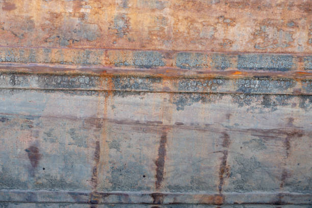 Steel dirt patina hull old ship in Rotterdam harbor