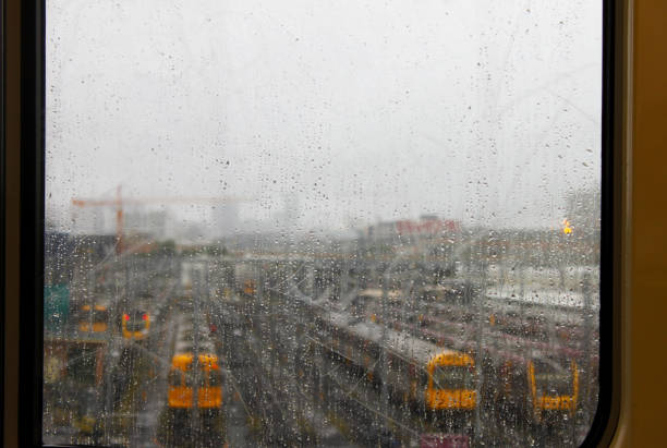 istock Train yard seen through rainy train window in Brisbane Australia 945144578