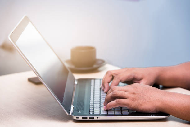istock young business man typing laptop, office man working 945145224