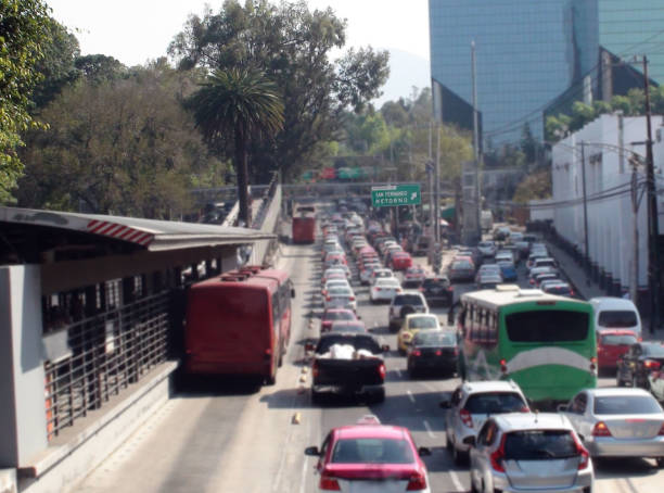 istock Mexico City Rush Hour Traffic Jam Including Building Exterior Scenery In Mexico 945147938