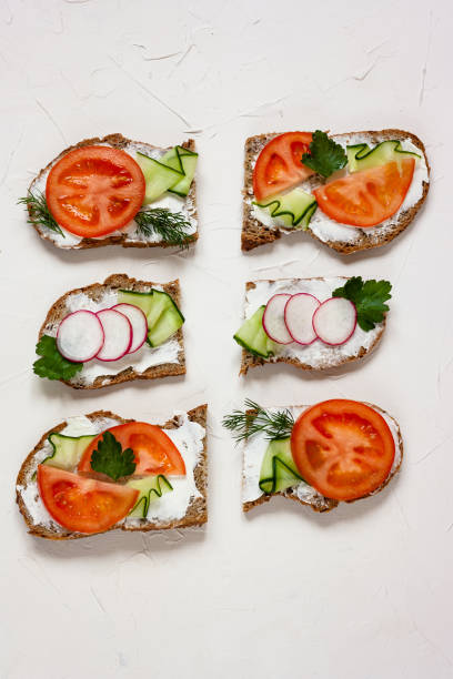 istock Healthy and diet tasty sandwiches top view copy space 945148080