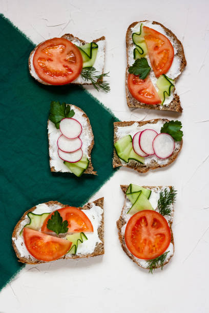 istock Healthy and diet tasty sandwiches top view copy space 945148090