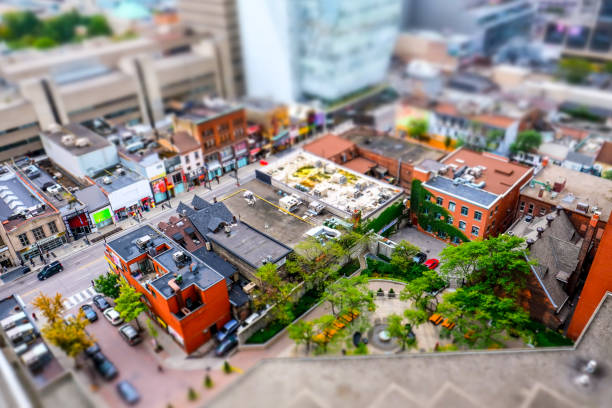 Interesting, miniature diorama effect seen from a tall vantage point of the Toronto city centre. Showing the various building designs and streets below. diorama photos stock pictures, royalty-free photos & images