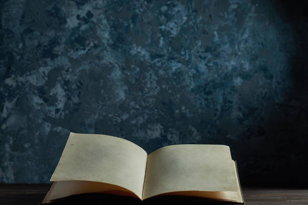 istock Still life an open book on the table, a place for your text 945159826