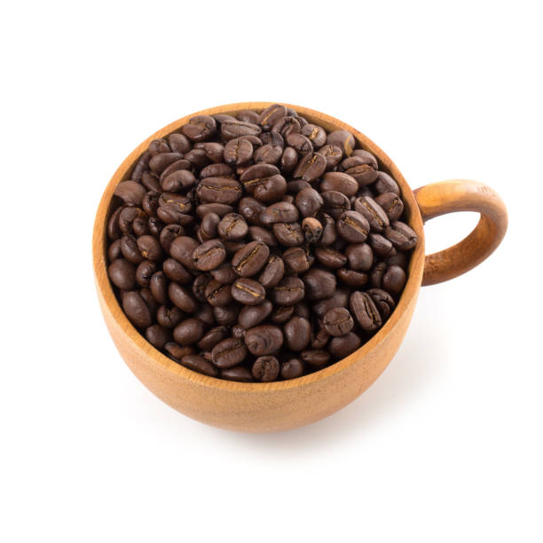 istock Coffee beans in wooden cup ioslated on a white background 945160070