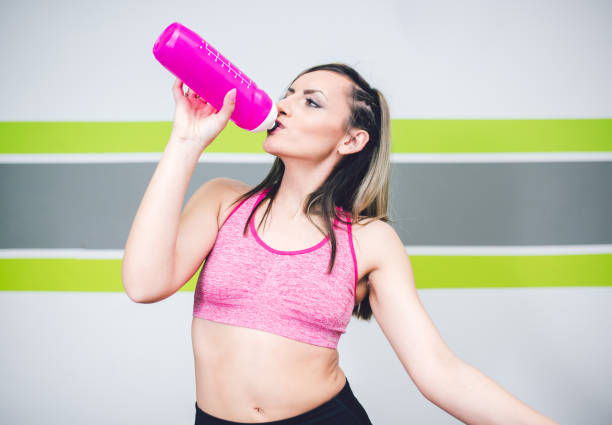 istock Woman working out in gym 945168500