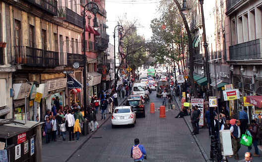 Mexico City Shopping District, People, Land Vehicle And Building Exterior View In Mexico