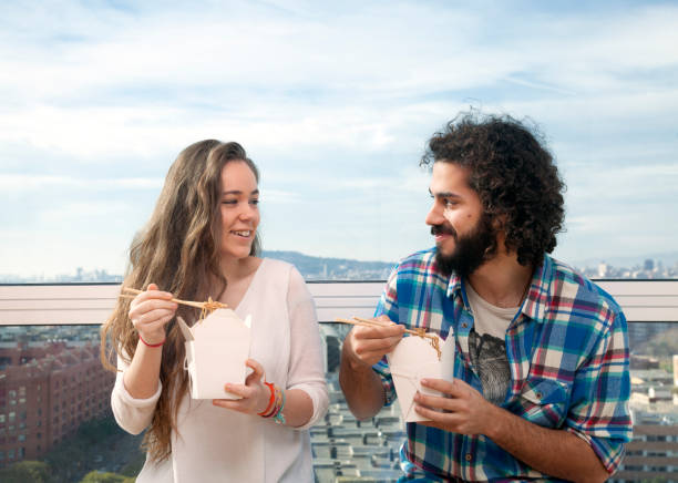 istock Young couple eating yakisoba 945170016
