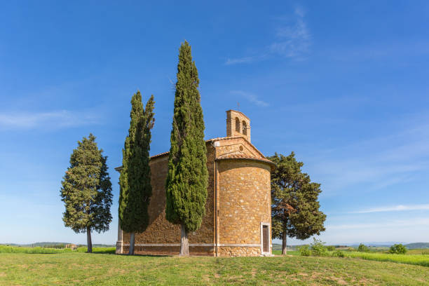 istock Chapel on a hill with cypress trees 945173466
