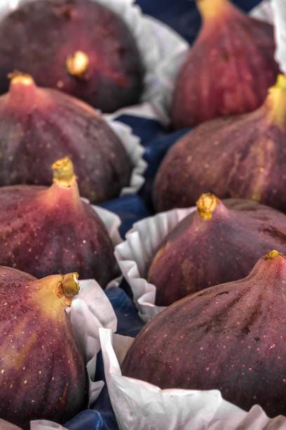 Figs fresh in paper form, beautiful, violet, close-up