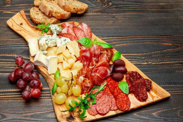 istock Cold meat cheese plate with salami sausage, prosciutto and cheese 945182142