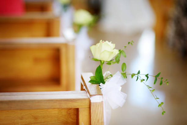 Beautiful flower wedding decoration in a church during catholic wedding ceremony