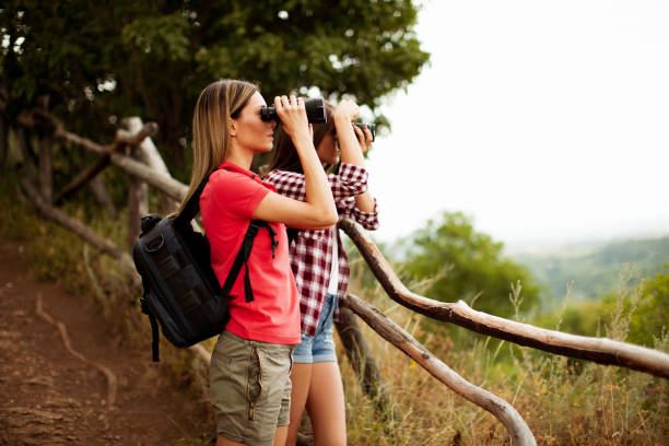 istock Two young women hiking and exploring the mountain 945199570