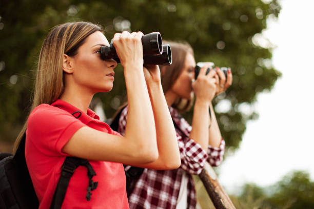 istock Two young women hiking and exploring the mountain 945199760