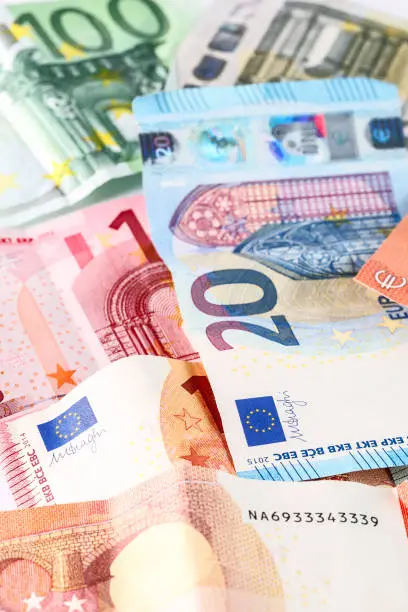 Photo of Euro cash. Many Euro banknotes of different values. Euro cash background.