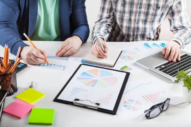 istock Stock market chart and finger pointing 945207188
