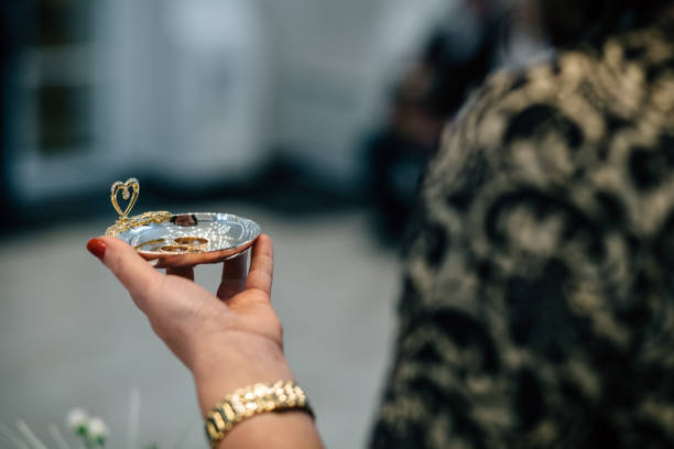 istock gold rings on a saucer 945218114