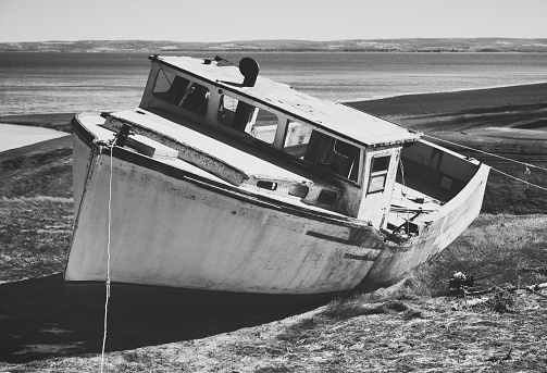 Old ghost boat - black and white - Fjord Pacific Ocean - Patagonia - Chile
