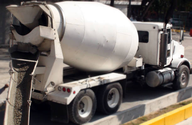 istock Cement Mixer Truck At Construction Site Scene 945230186