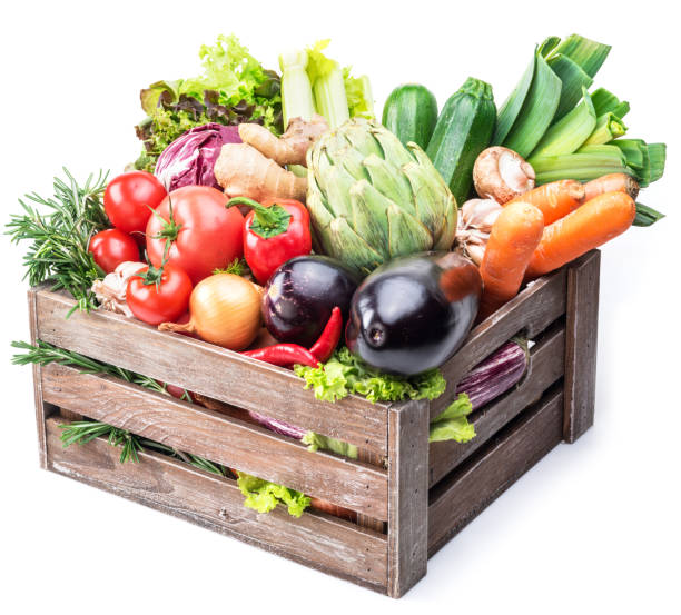 istock Fresh multi-colored vegetables in wooden crate. 945230922