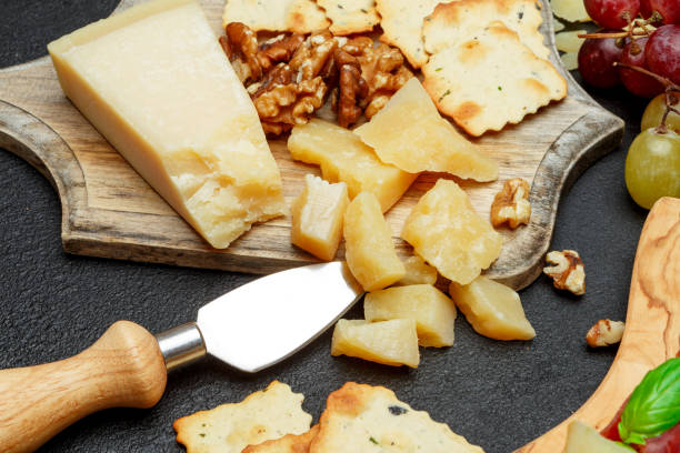 istock the parmesan cheese on cutting board 945236438
