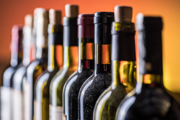 istock Line of wine bottles. 945236598