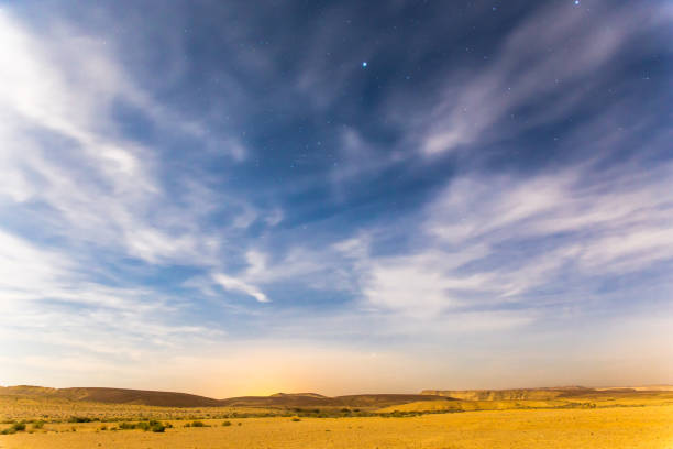 istock Desert night sky stars cloudy view. 945236672