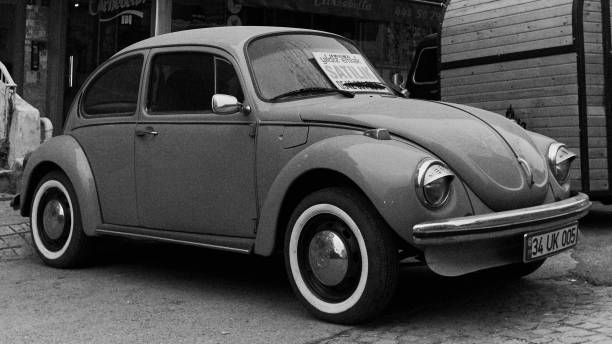 Borgosesia, Italy - September 19, 2011: Old red Volkswagen Beetle model VW 1303 parked in a parking lot in Borgosesia, back view.