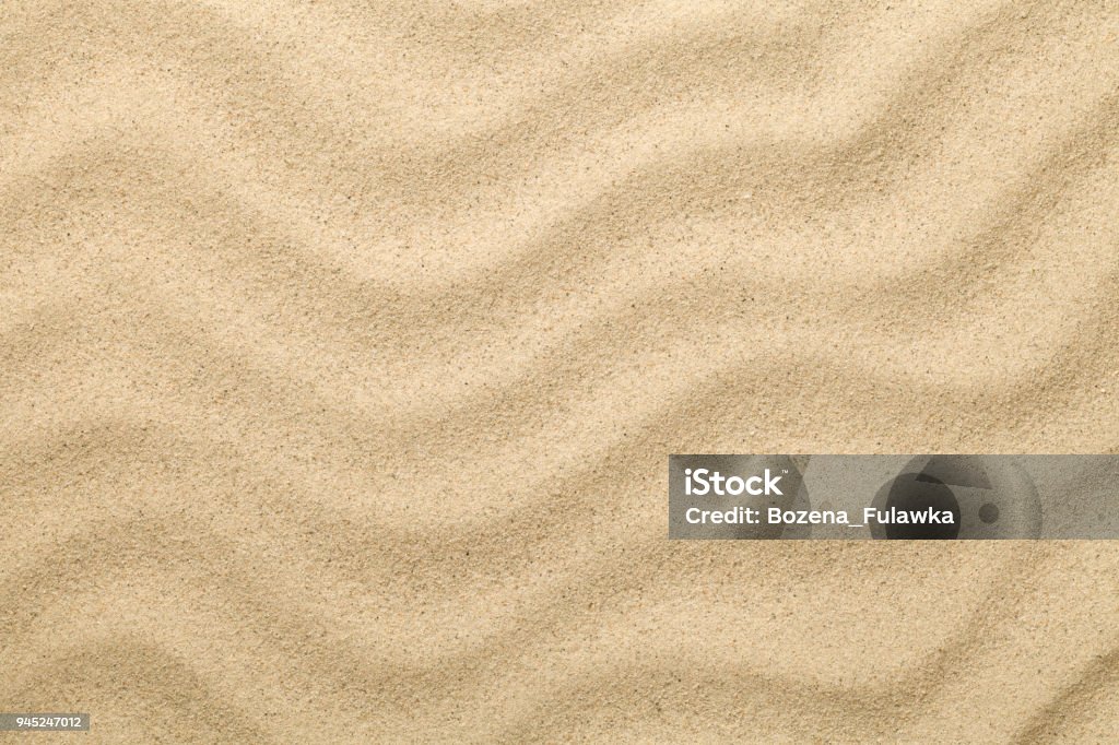 Sandy Background. Sand Beach Texture for Summer Sandy background. Sand beach texture for summer. Copy space. Top view Sand Stock Photo