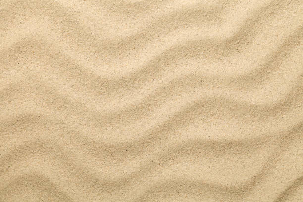 Sandy Background. Sand Beach Texture for Summer Sandy background. Sand beach texture for summer. Copy space. Top view beach sand stock pictures, royalty-free photos & images