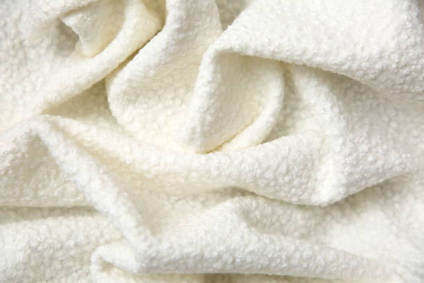istock Cotton blanket with an interesting texture and crumpled irregularly in a rather artistic way. 945251676
