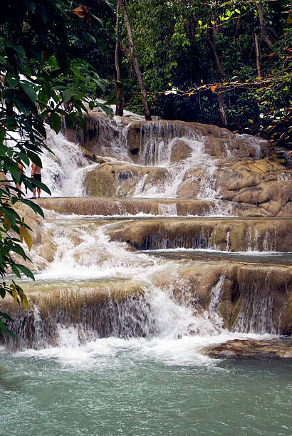 Dunns River Falls - Jamaica Dunns River Falls - Jamaica, a favorite tourist destination dunns river falls stock pictures, royalty-free photos & images
