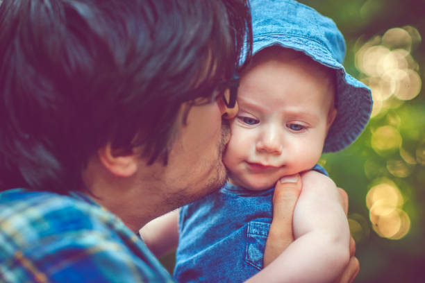 istock Father with Baby Outdoors 945266028