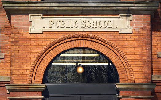 Entrance to an Old Red Brick Public School Building