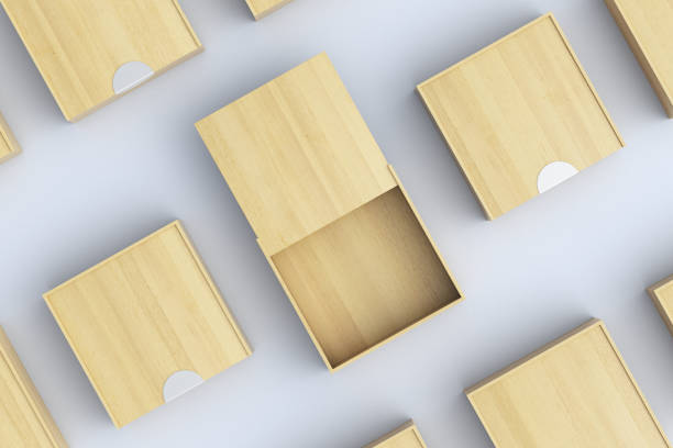 Empty light wooden square box with opened sliding lid with closed boxes around on white background. 3d illustration
