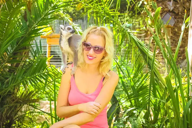 Photo of Woman with lemur