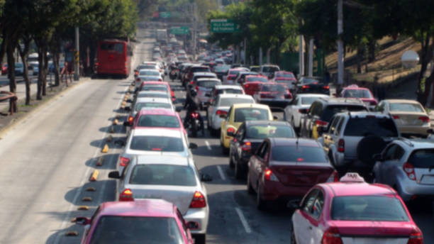 istock Mexico City Traffic Jam During Rush Hour And Tree Scene In Mexico 945285876