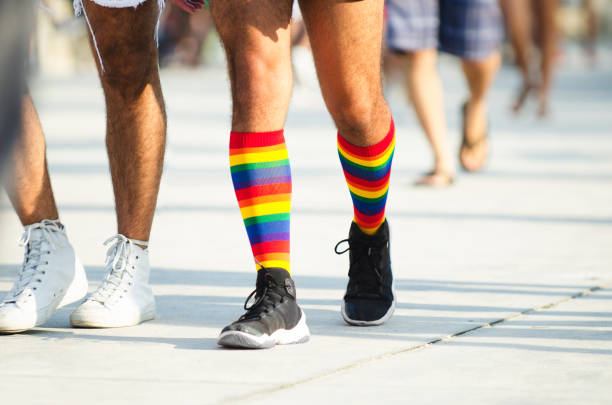 istock Rainbow Socks at Gay Pride Parade 945289314
