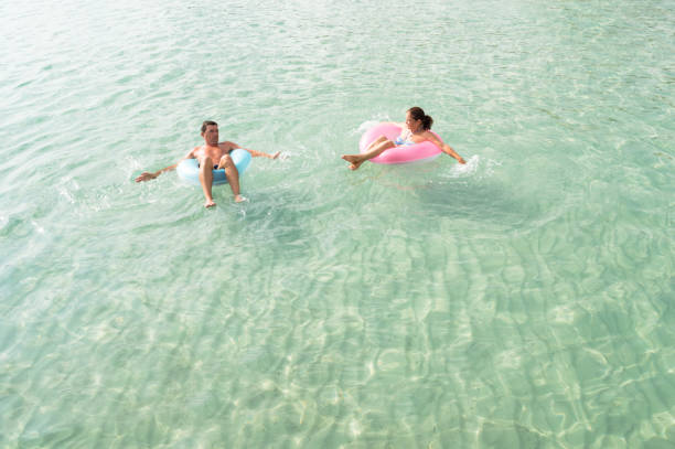 istock Senior couple enjoy sea water 945291122