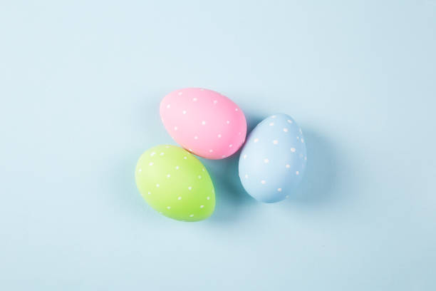istock Easter eggs blue background Colorful holidays banner 945296996