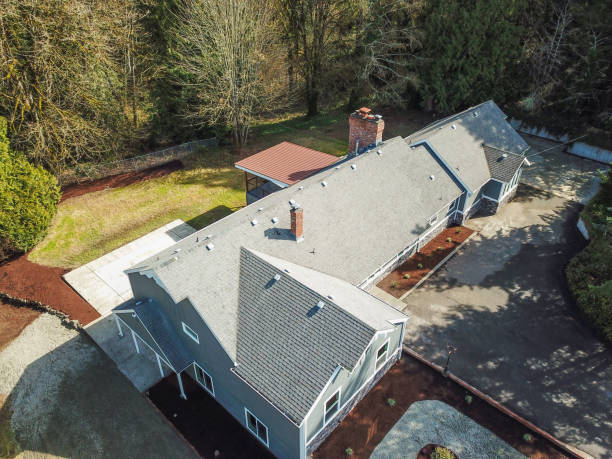 istock Aerial view of Large grey home surrounded by trees 945312622