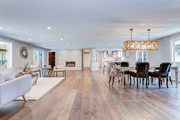 istock Spacious living and dining room with hardwood floor 945313020