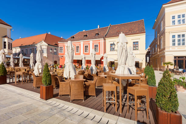 istock Main town square with restaurant patios in Gyor Hungary 945313588