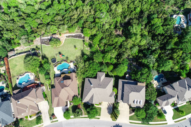 istock Straight down view above Suburb homes rooftop new development 945316000