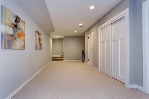 istock Wide hallway of home basement 945316072
