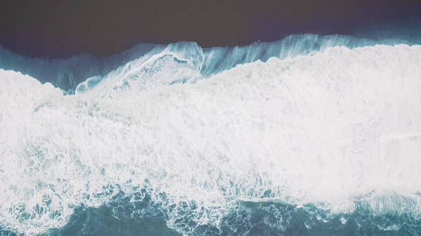 istock Aerial view on black sand beach 945316126