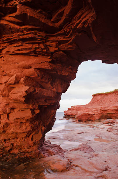 istock Red sandstone pillars on the Atlantic ocean 945330214